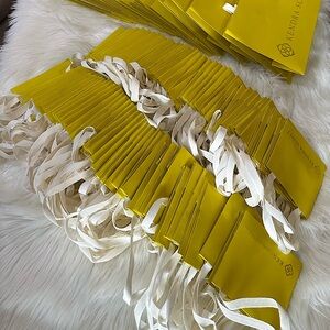 Kendra Scott yellow and white and gold small gift bags